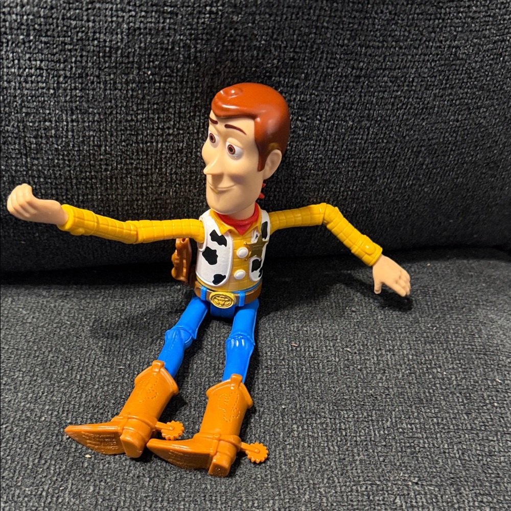 Disney Cowboy Action Figure with Yellow and Blue Outfit